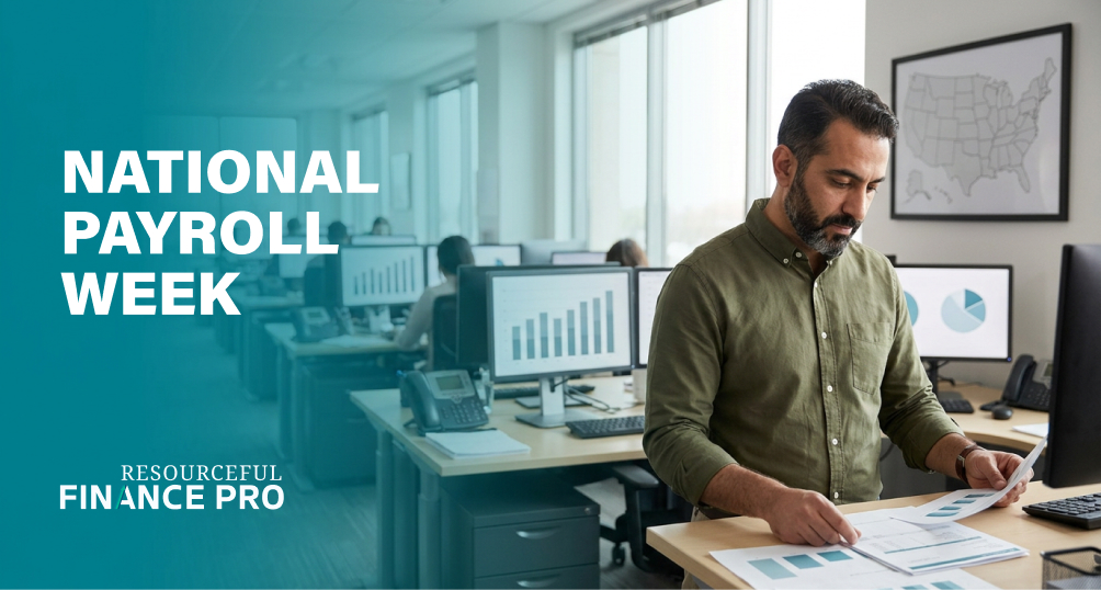 Payroll manager reviewing a pay run on a busy payroll floor during National Payroll Week 2026